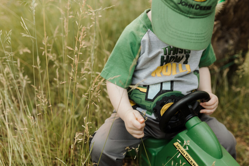 northern michigan photographer discusses importance of documenting milestones with john deere photoshoot