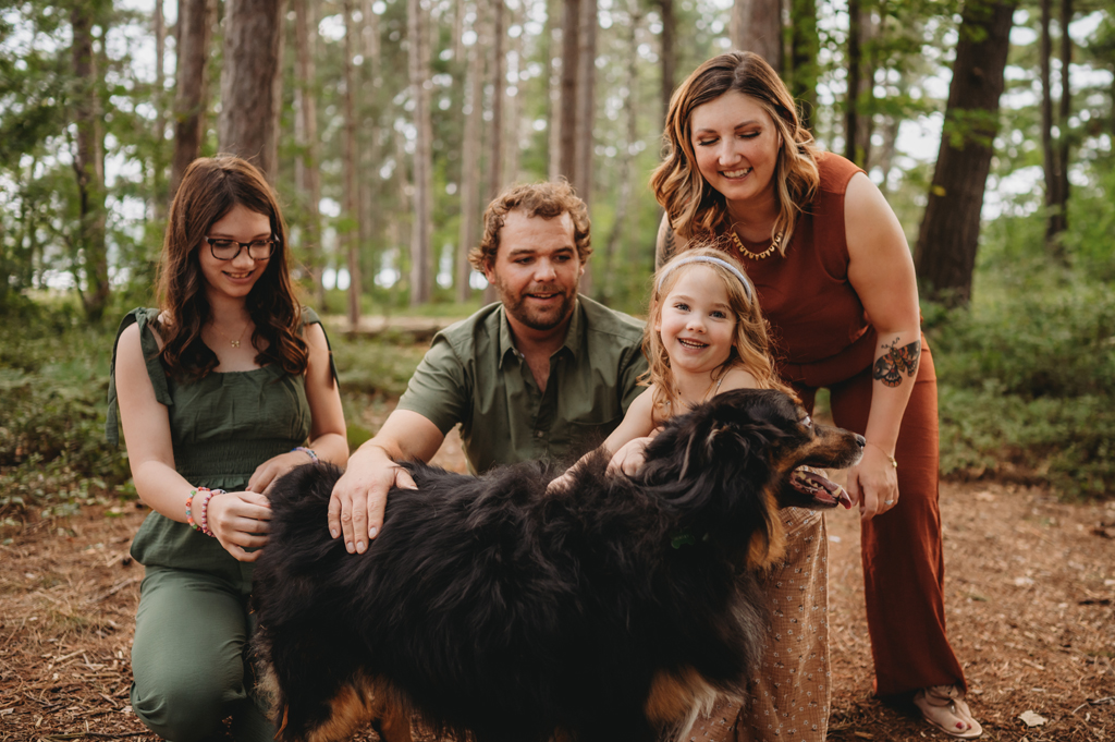 dad and daughter with australian shepherd dog